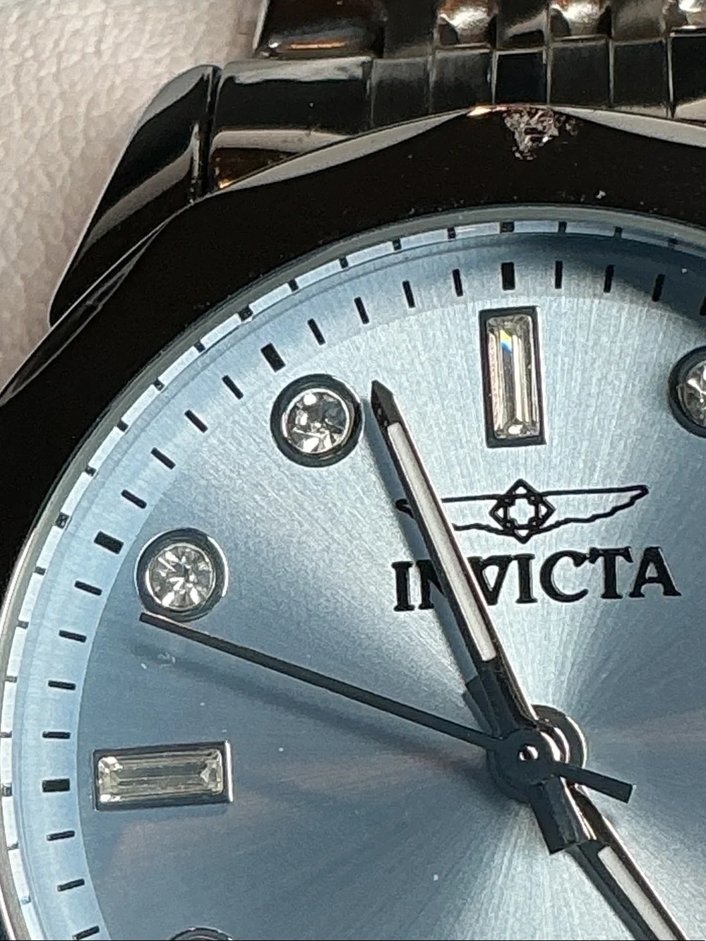 Invicta women’s Silver Watch with Light Blue Dial and Crystal Markers